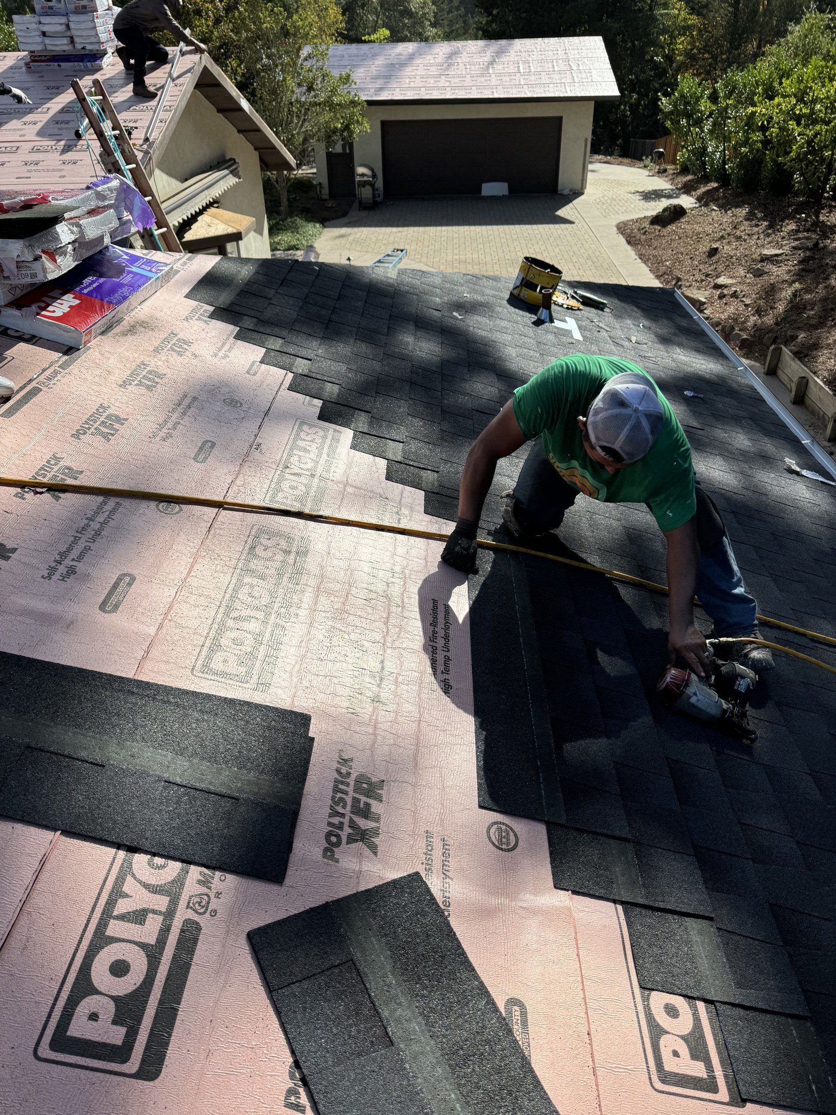 R2L Roofing crew installing a shingle roof in the East Bay